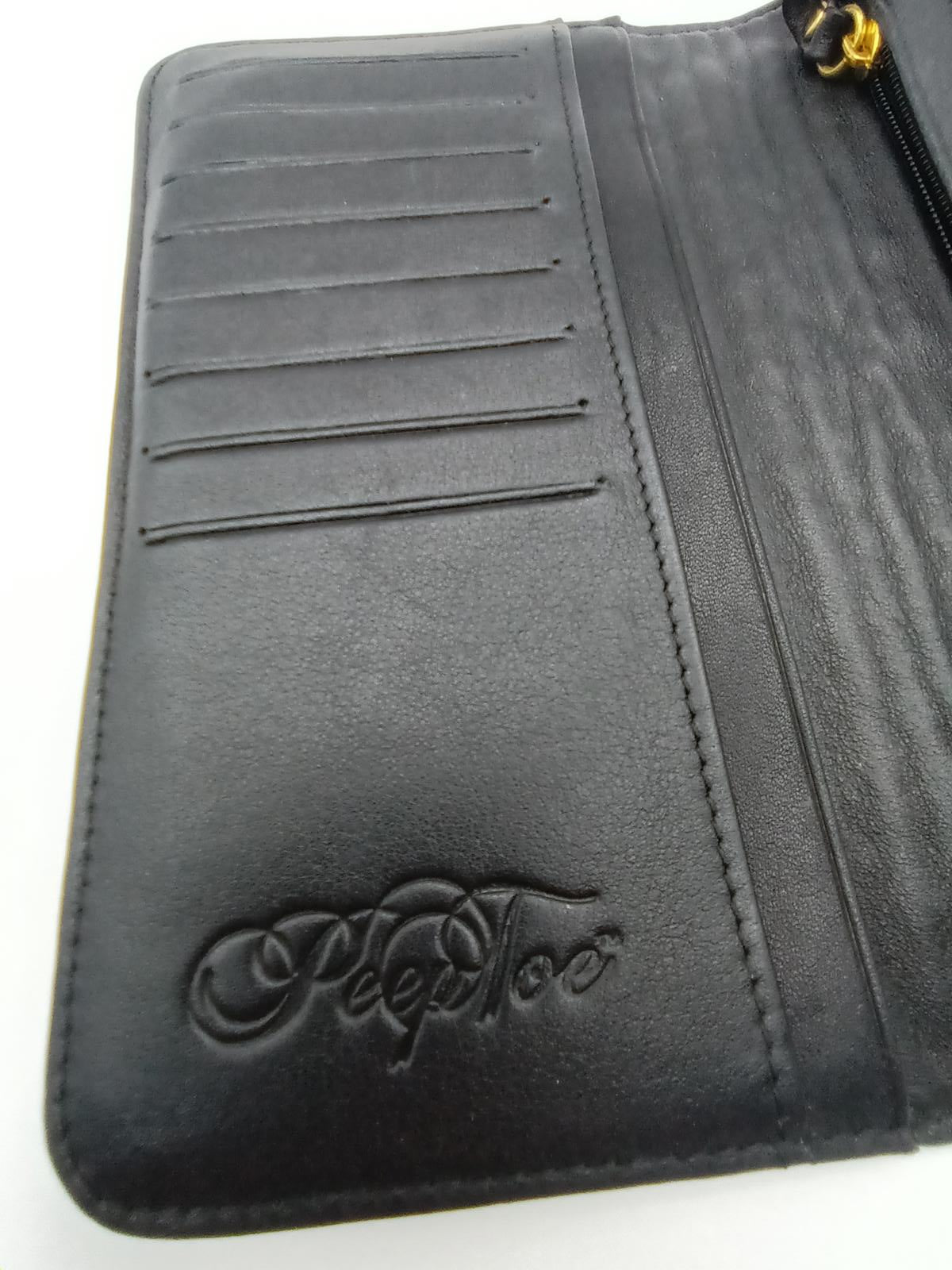 Leather Peeptoe gold studded wallet.