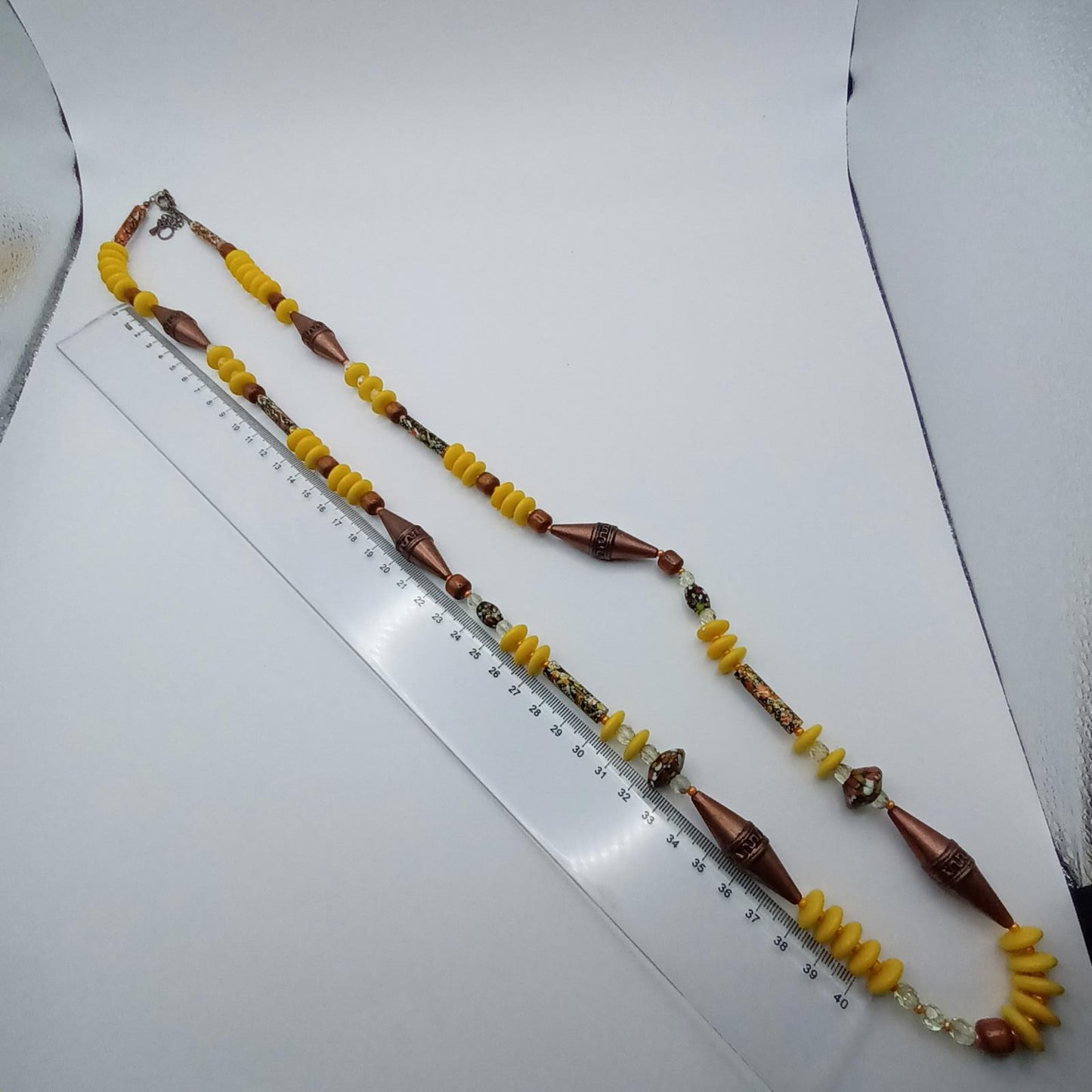 Yellow and bronze beaded necklace with hand painted glass beads.