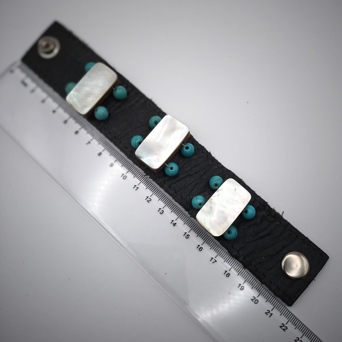 Vintage hand made black leather and mother of pearl cuff.