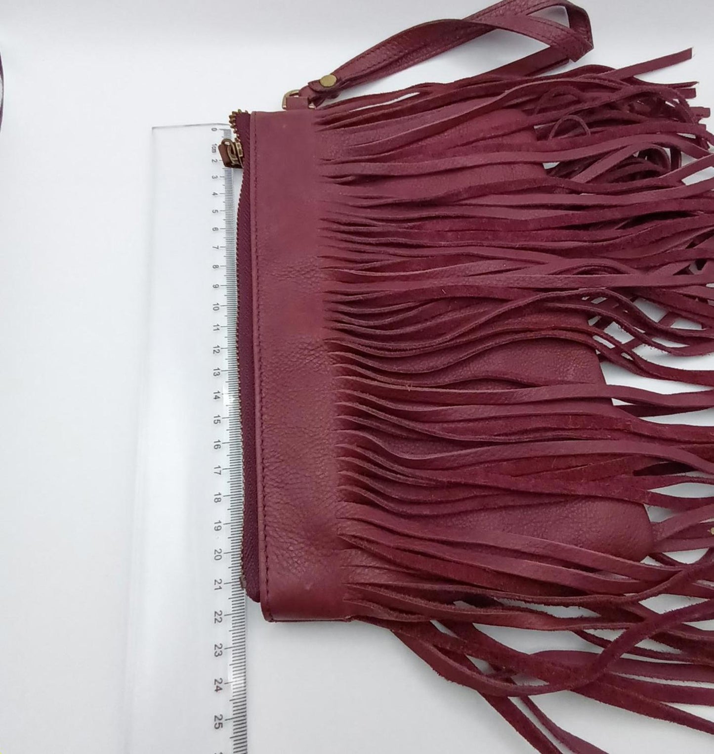 Burgundy fringed leather clutch JAG