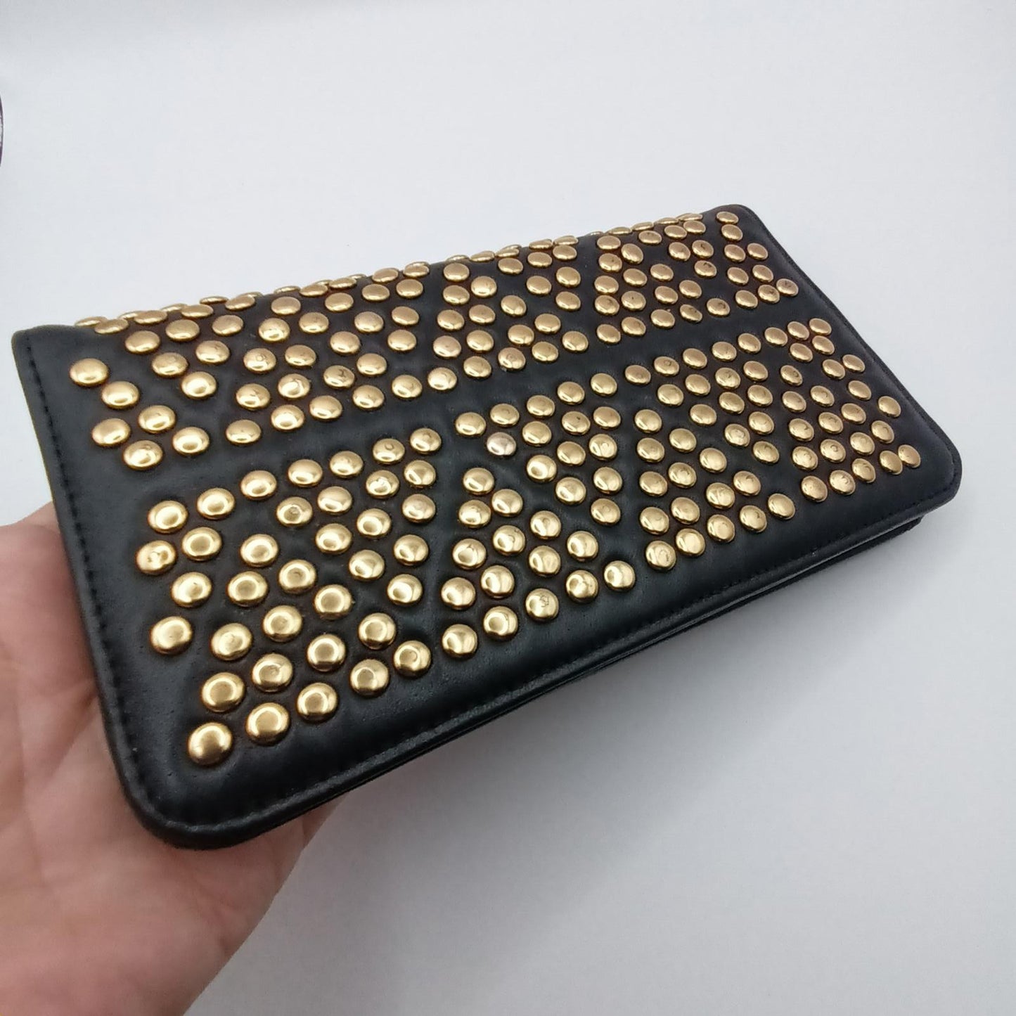 Leather Peeptoe gold studded wallet.
