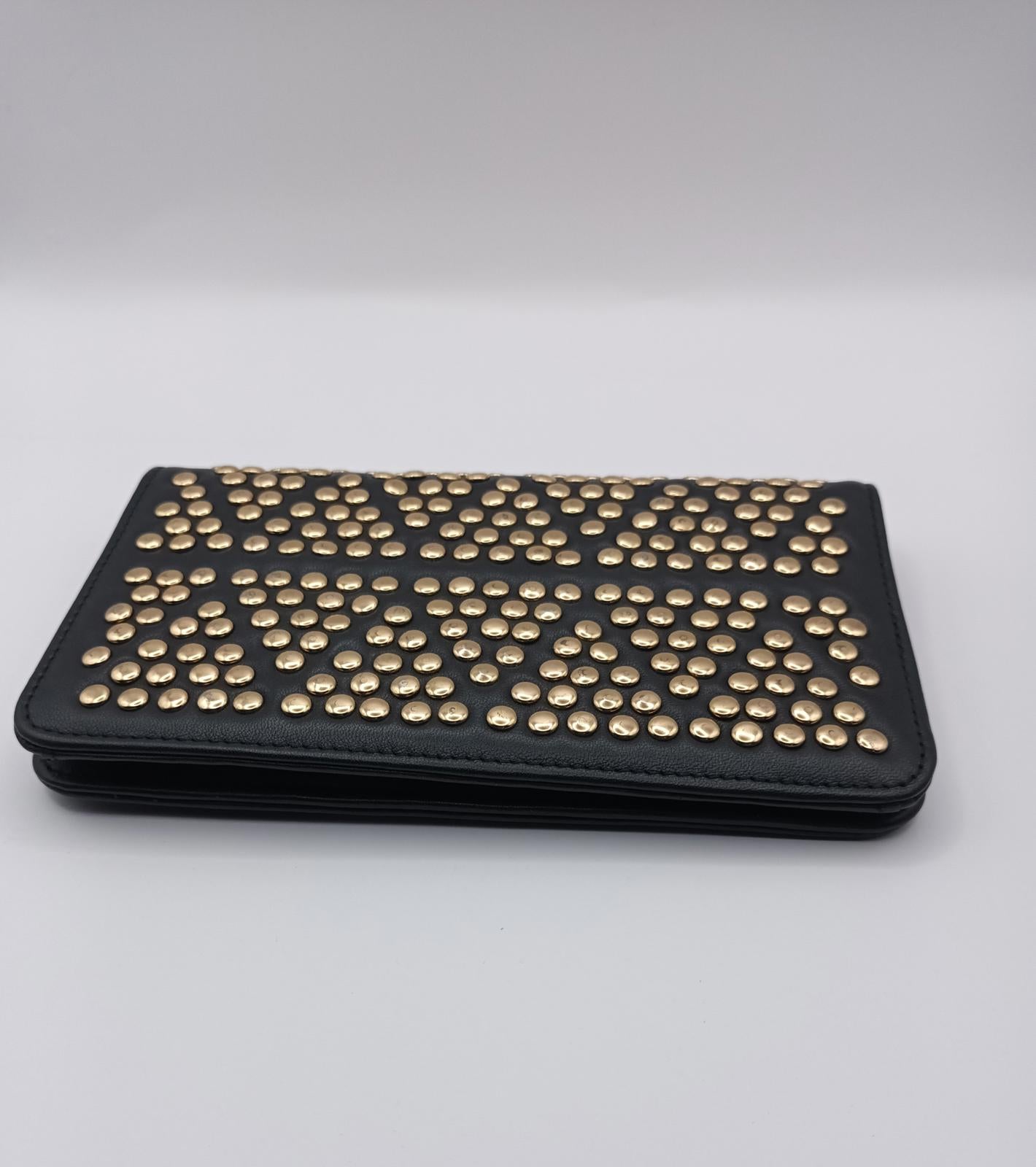 Leather Peeptoe gold studded wallet.