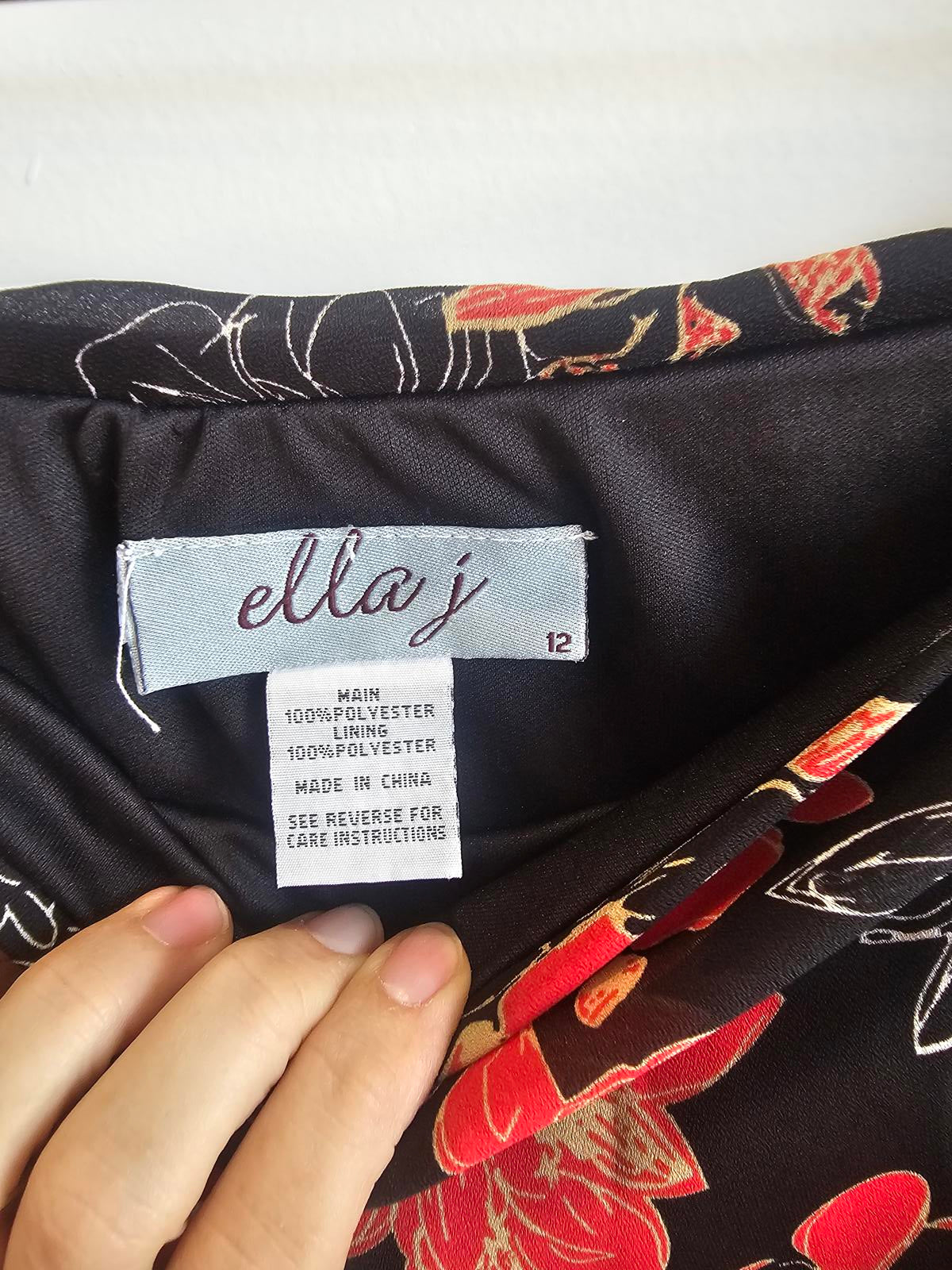 Vintage 90s ella J Black floral asemetrical skirt.