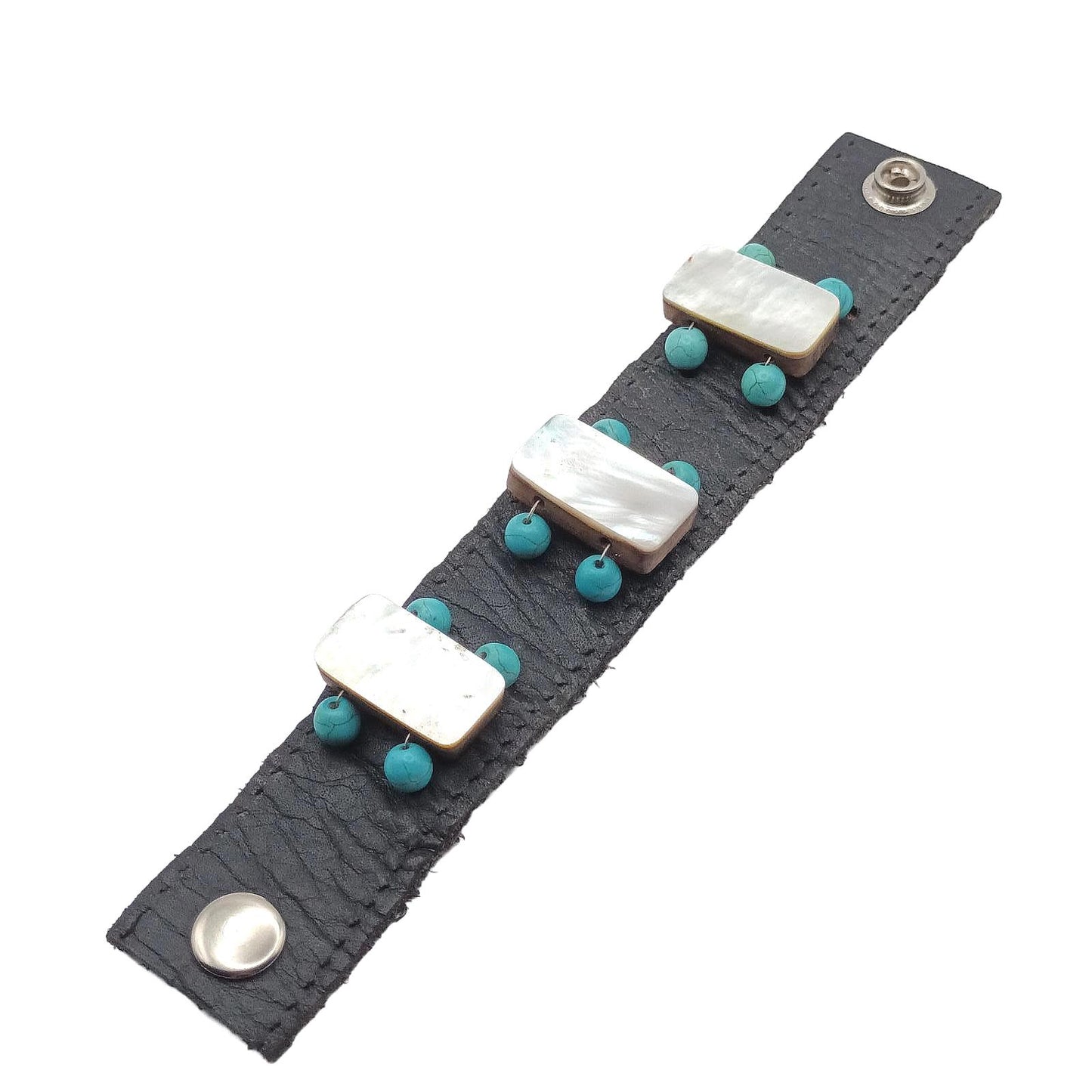 Vintage hand made black leather and mother of pearl cuff.