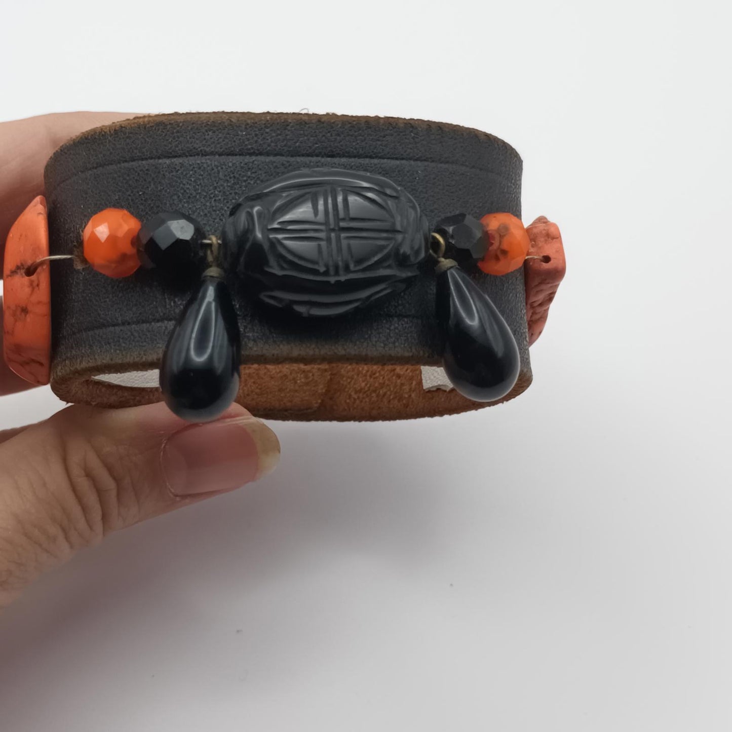 Vintage Handmade black leather cuff with black oriental stone embellishments.