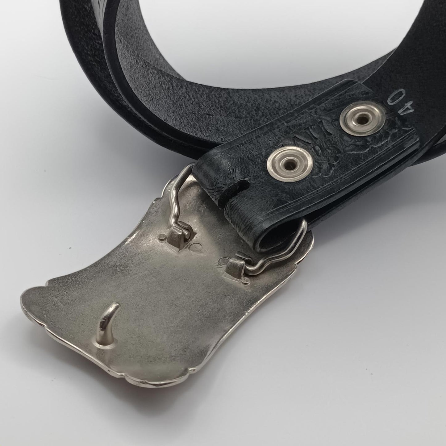 Vintage black tooled leather Live to ride silver buckled belt.