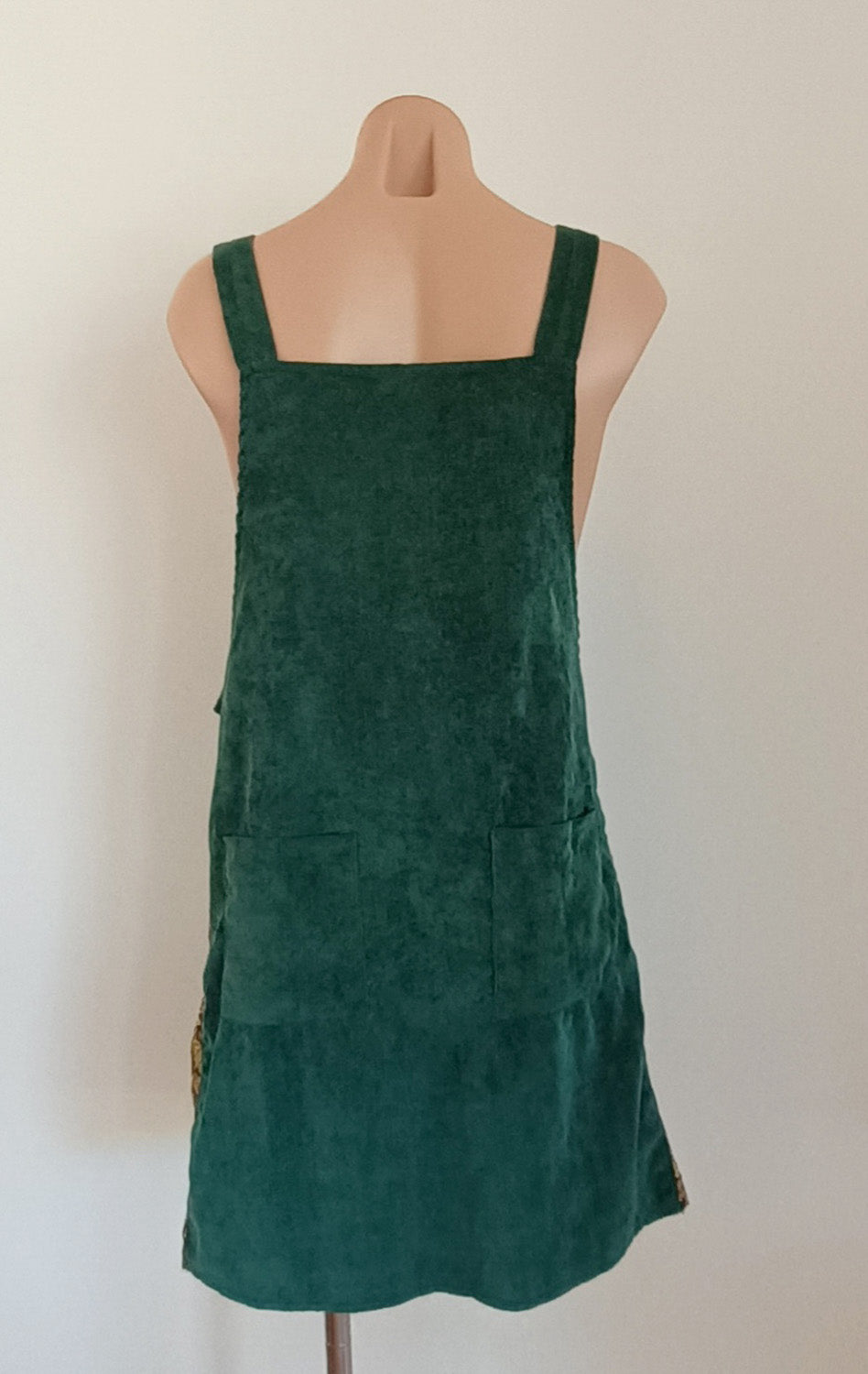 Green and floral hand made velvet pinafore dress.
