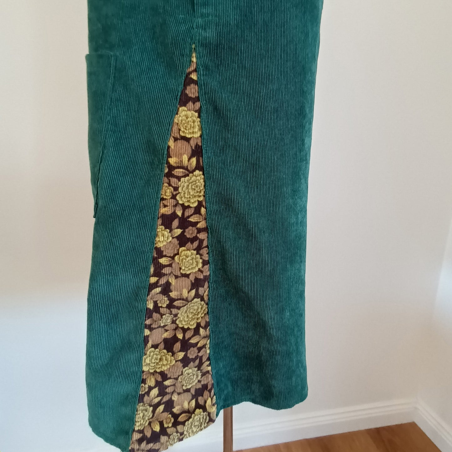 Green and floral hand made velvet pinafore dress.