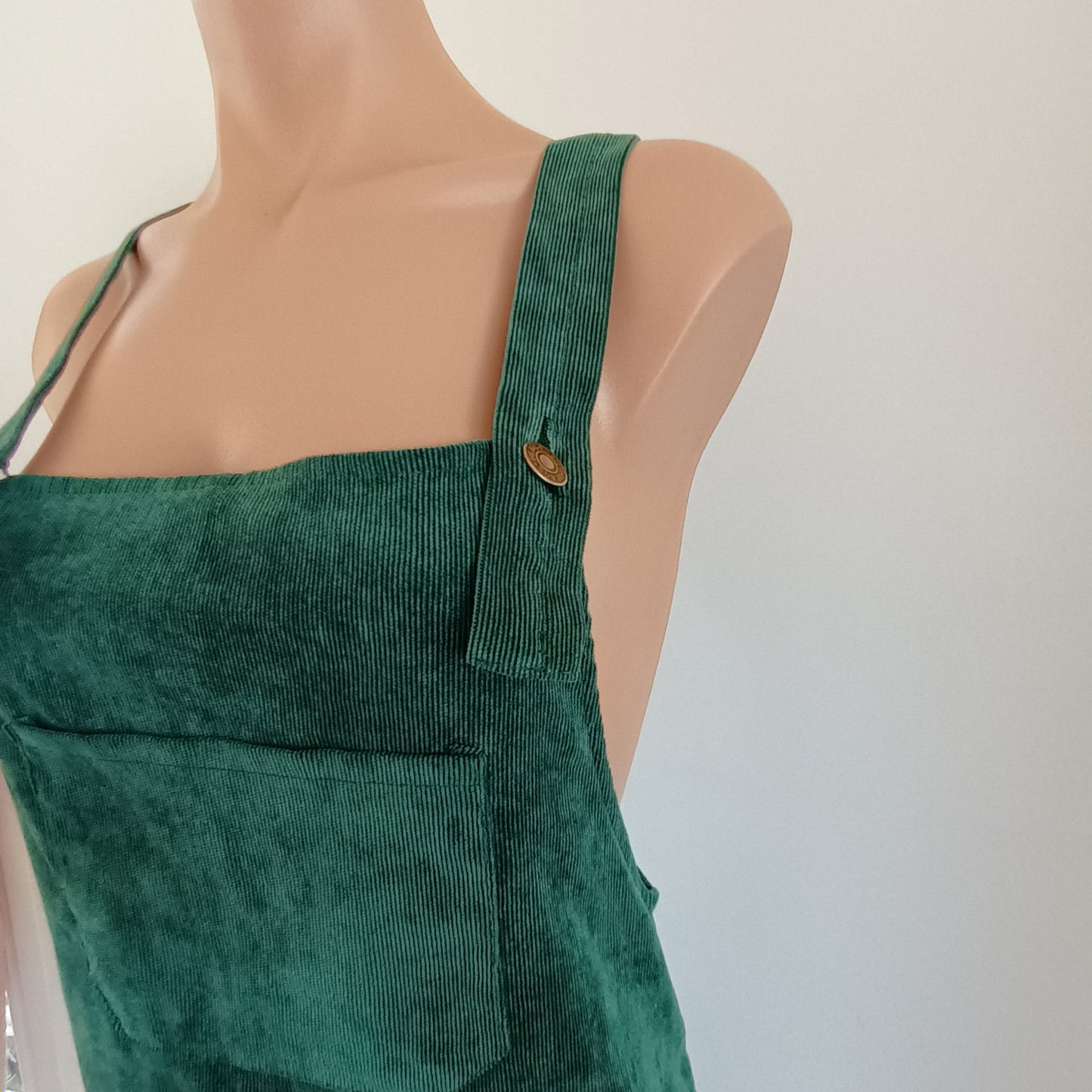 Green and floral hand made velvet pinafore dress.
