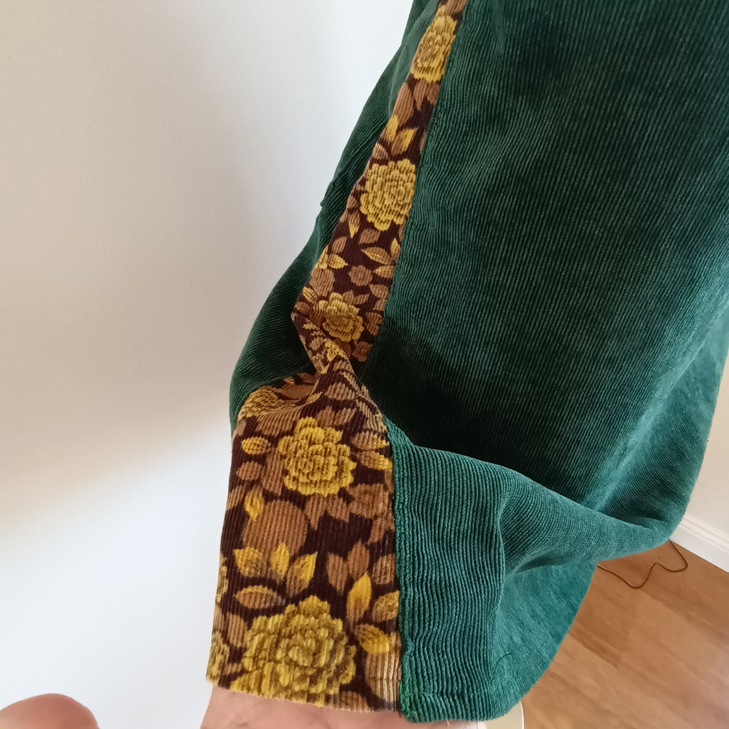 Green and floral hand made velvet pinafore dress.