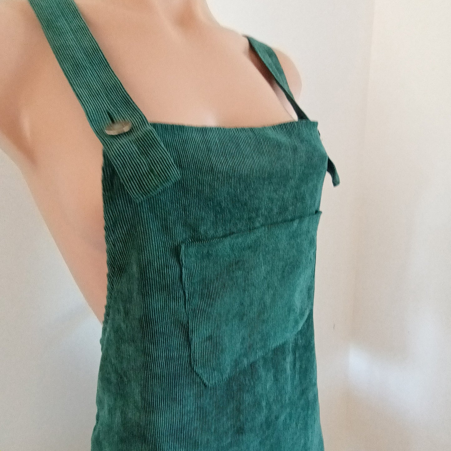 Green and floral hand made velvet pinafore dress.