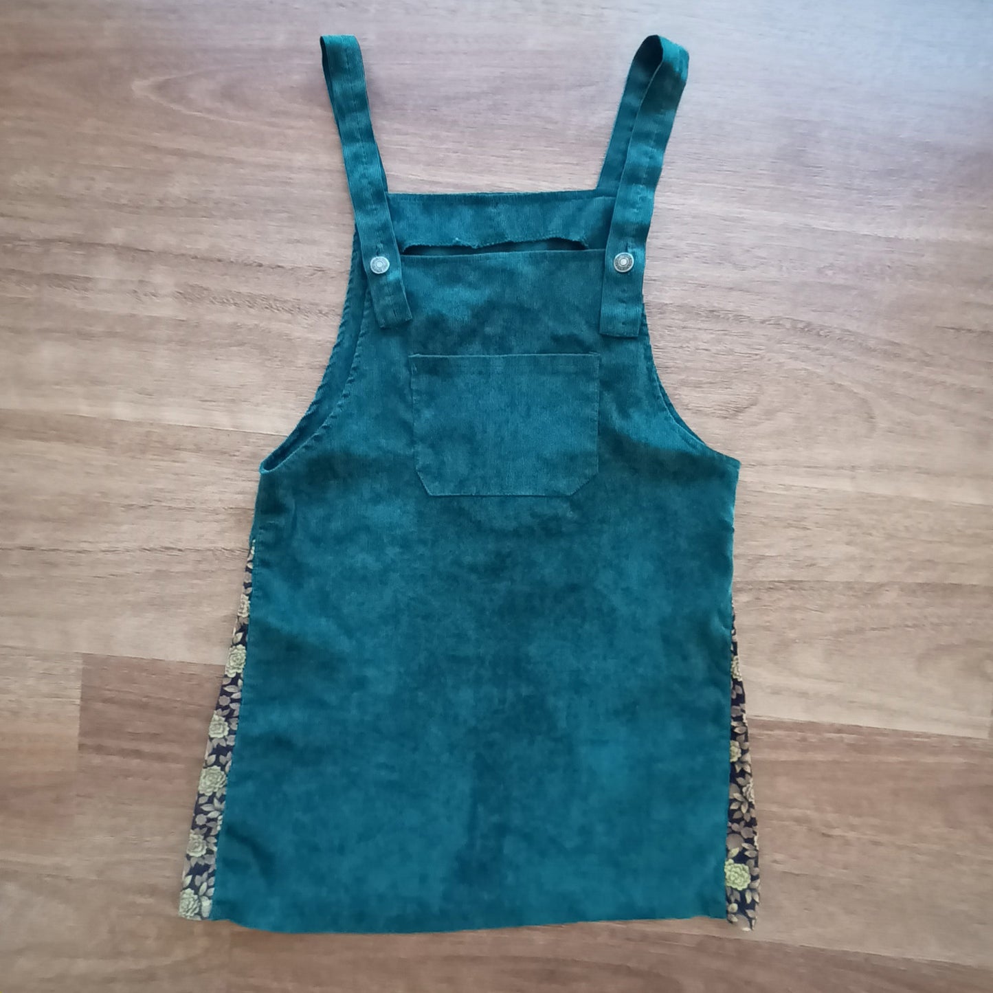 Green and floral hand made velvet pinafore dress.