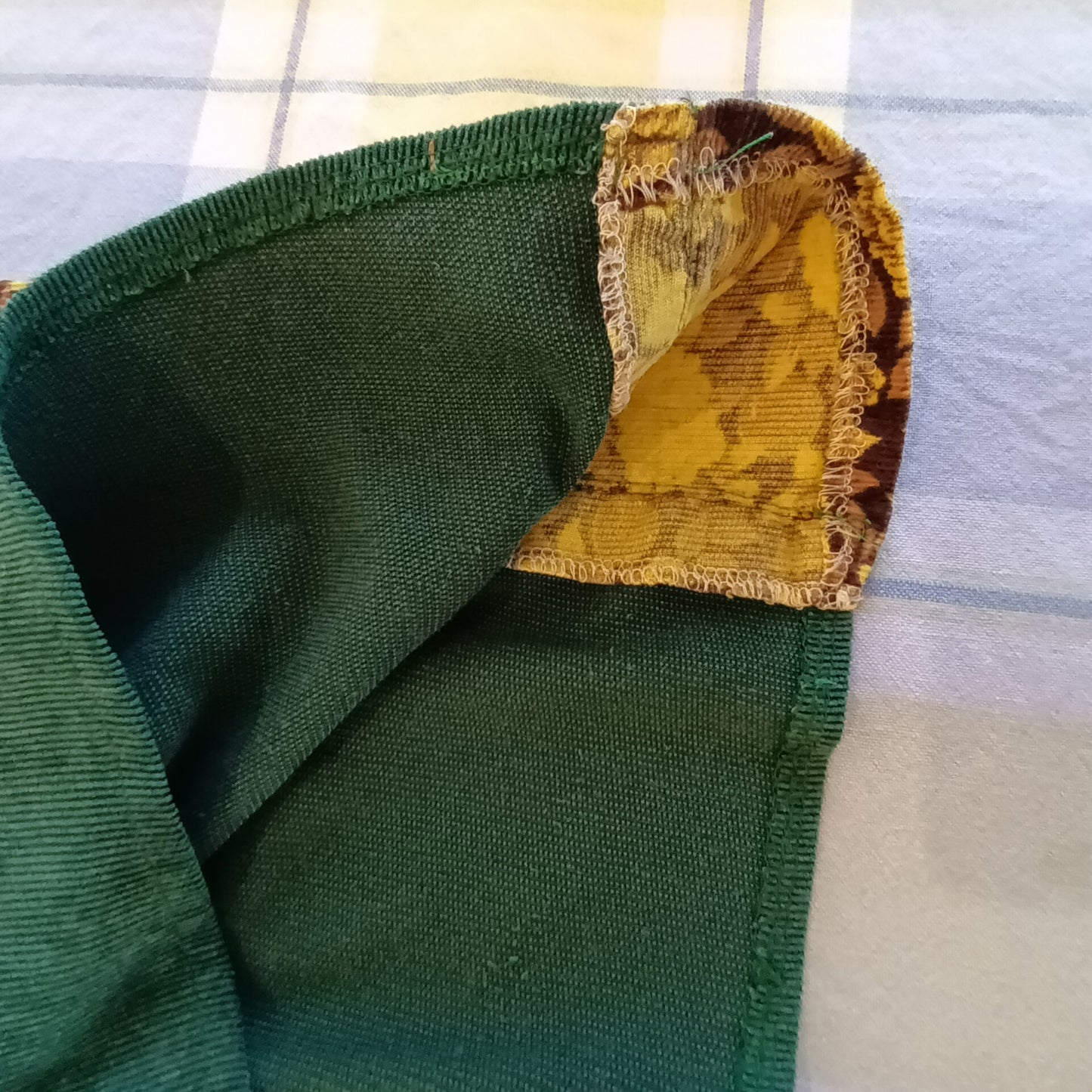 Green and floral hand made velvet pinafore dress.