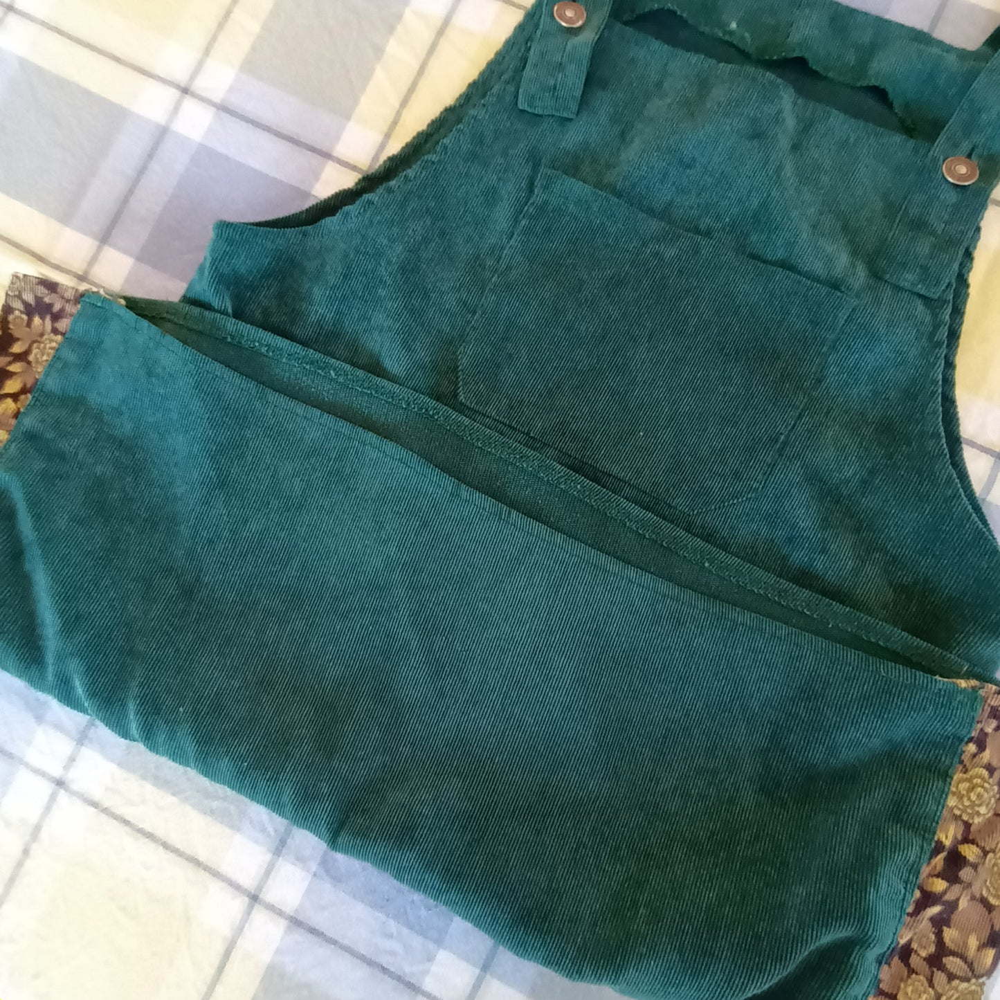 Green and floral hand made velvet pinafore dress.