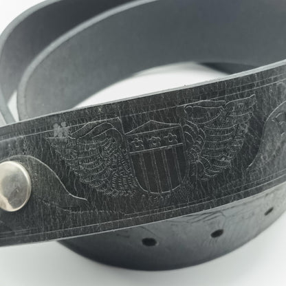 Vintage black tooled leather Live to ride silver buckled belt.