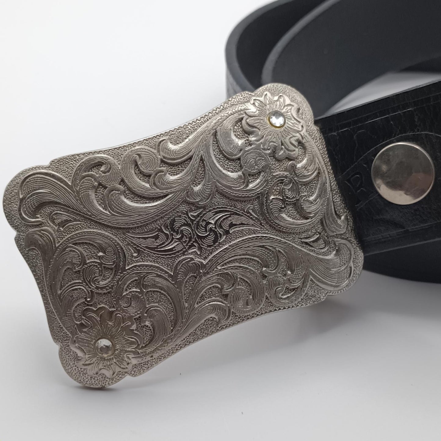 Vintage black tooled leather Live to ride silver buckled belt.