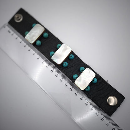 Vintage hand made black leather and mother of pearl cuff.