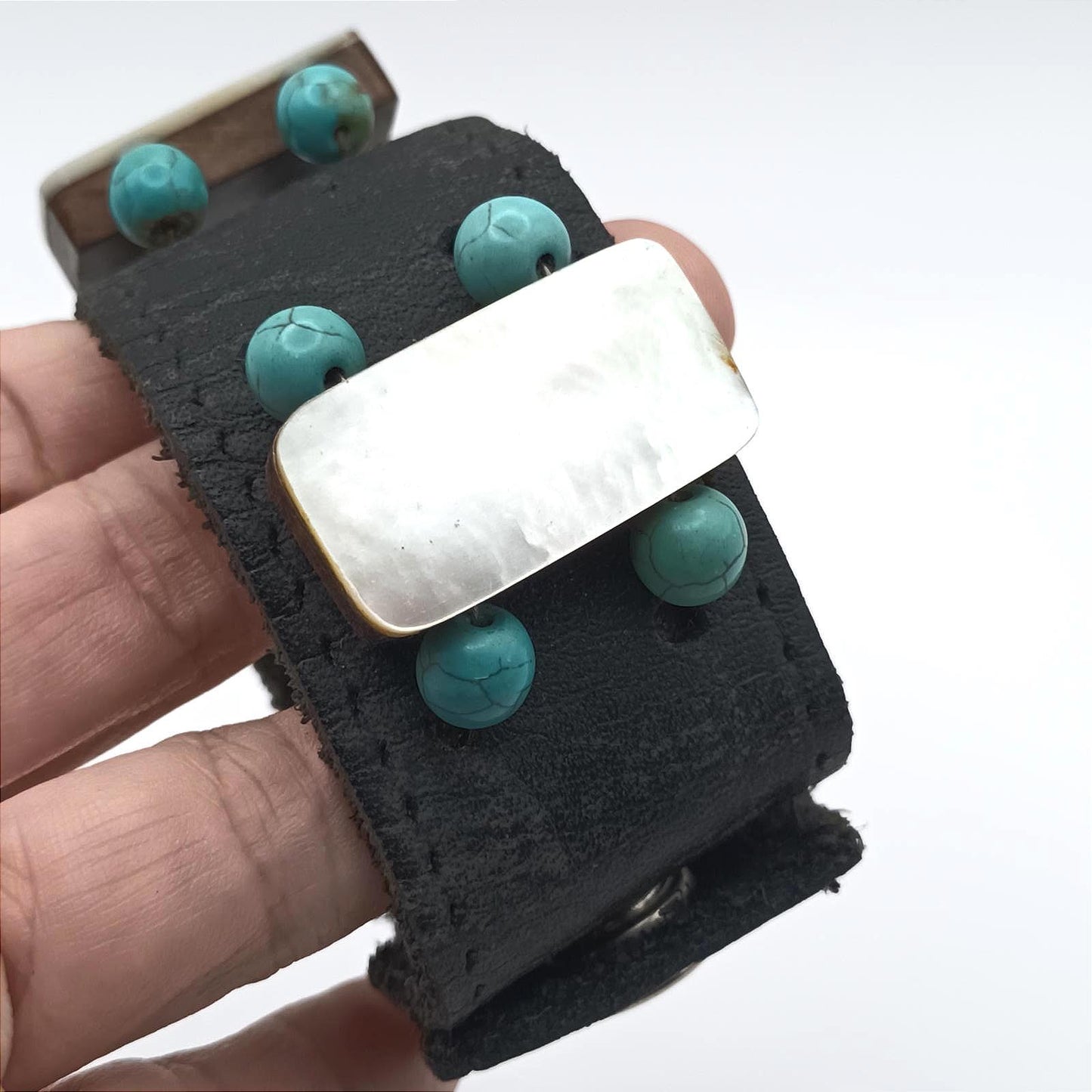 Vintage hand made black leather and mother of pearl cuff.