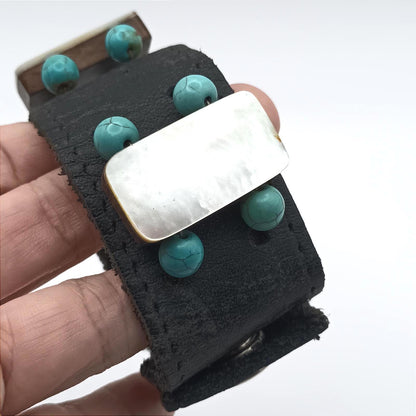 Vintage hand made black leather and mother of pearl cuff.