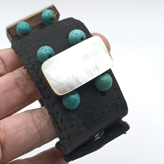 Vintage hand made black leather and mother of pearl cuff.