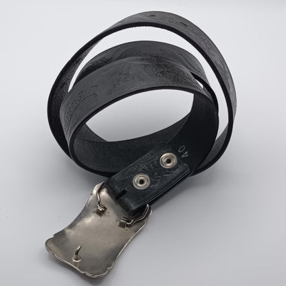 Vintage black tooled leather Live to ride silver buckled belt.