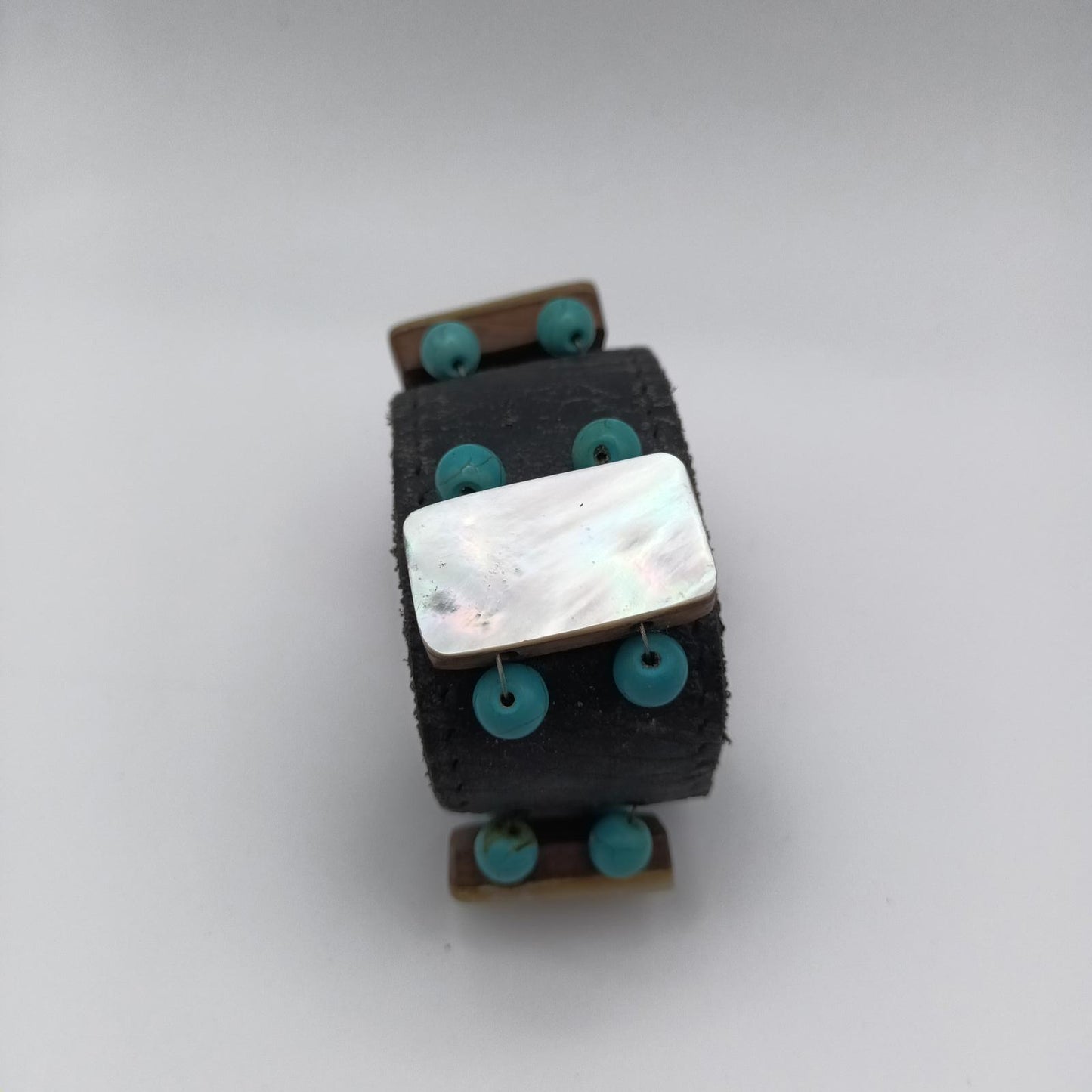 Vintage hand made black leather and mother of pearl cuff.