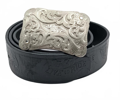 Vintage black tooled leather Live to ride silver buckled belt.