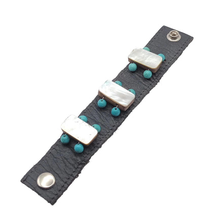 Vintage hand made black leather and mother of pearl cuff.