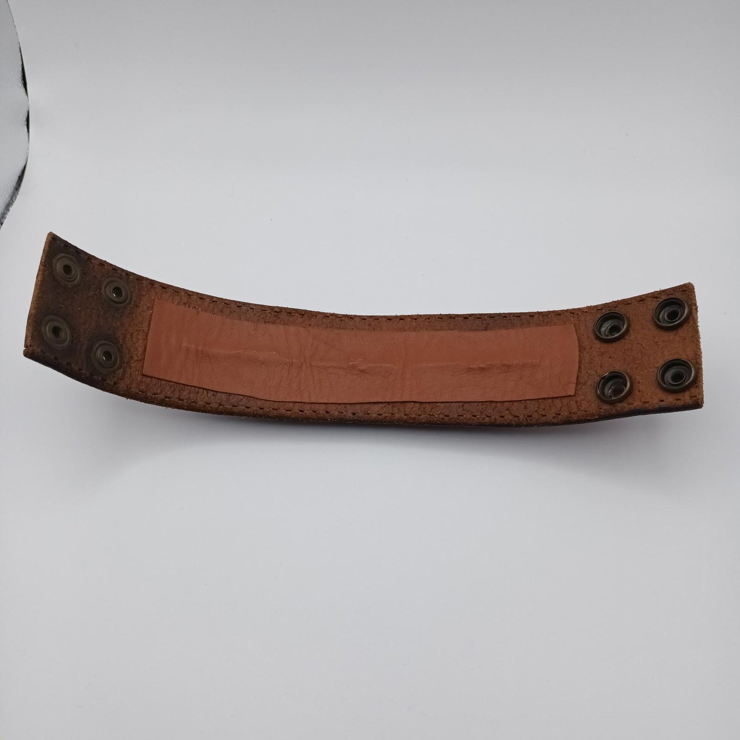 Vintage Handmade brown leather cuff with blue oriental stone embellishments