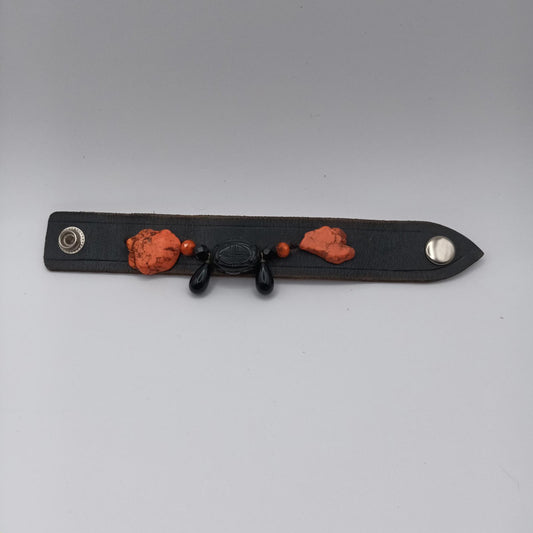 Vintage Handmade black leather cuff with black oriental stone embellishments.